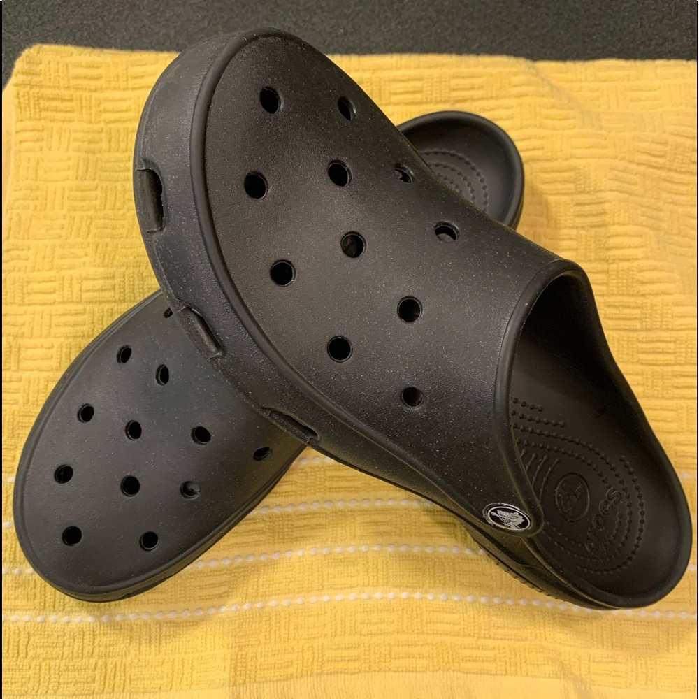 Womens black Crocs.